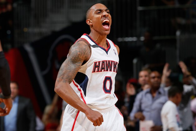 ATLANTA, GA - APRIL 24:  Jeff Teague #0 of the Atlanta Hawks reacts after a dunk against the Indiana Pacers in Game 3 of the Eastern Conference Quarterfinals during the 2014 NBA Playoffs at Philips Arena on April 24, 2014 in Atlanta, Georgia.  NOTE TO USER: User expressly acknowledges and agrees that, by downloading and or using this photograph, User is consenting to the terms and conditions of the Getty Images License Agreement.  (Photo by Kevin C. Cox/Getty Images)