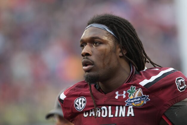 Jan 1, 2014; Orlando, FL, USA; South Carolina Gamecocks defensive end Jadeveon Clowney (7) runs off the field after the second quarter of the Capital One Bowl against the Wisconsin Badgers held at the Florida Citrus Bowl. Mandatory Credit: Rob Foldy-USA TODAY Sports