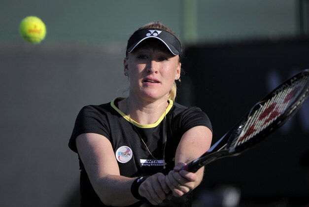 Elena Baltacha, of Britain, returns a shot to Arantxa Rus, of the Netherlands, at the BNP Paribas Open tennis tournament, Wednesday, March 7, 2012, in Indian Wells, Calif. Baltacha won 3-6, 6-4, 6-3. (AP Photo/Mark J. Terrill)