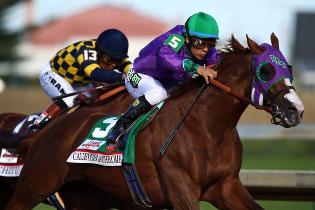 LOUISVILLE, KY - MAY 03:  California Chrome #5, ridden by Victor Espinoza, comes out of the fourth turn enroute to winning the 140th running of the Kentucky Derby at Churchill Downs on May 3, 2014 in Louisville, Kentucky.  (Photo by Andy Lyons/Getty Images)