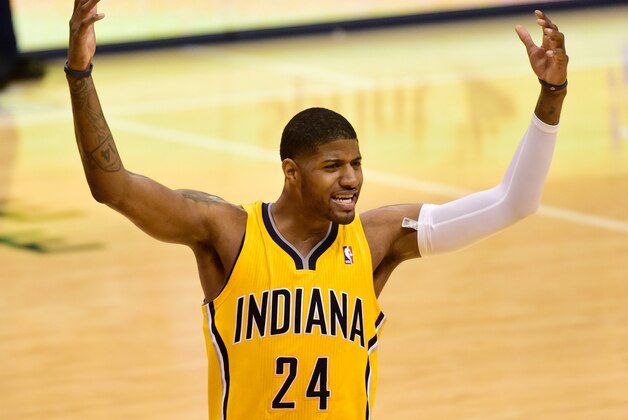May 3, 2014; Indianapolis, IN, USA; Indiana Pacers forward Paul George (24) reacts to a call during the second half of game seven of the first round of the 2014 NBA Playoffs at Bankers Life Fieldhouse against the Atlanta Hawks. Indiana Pacers beat Atlanta Hawks 92 to 80. Mandatory Credit: Marc Lebryk-USA TODAY Sports