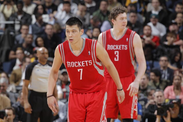 OAKLAND, CA - FEBRUARY 12:  Jeremy Lin #7 and Omer Asik #3 of the Houston Rockets in a game against the Golden State Warriors on February 12, 2013 at Oracle Arena in Oakland, California. NOTE TO USER: User expressly acknowledges and agrees that, by downloading and or using this photograph, user is consenting to the terms and conditions of Getty Images License Agreement. Mandatory Copyright Notice: Copyright 2013 NBAE (Photo by Rocky Widner/NBAE via Getty Images)