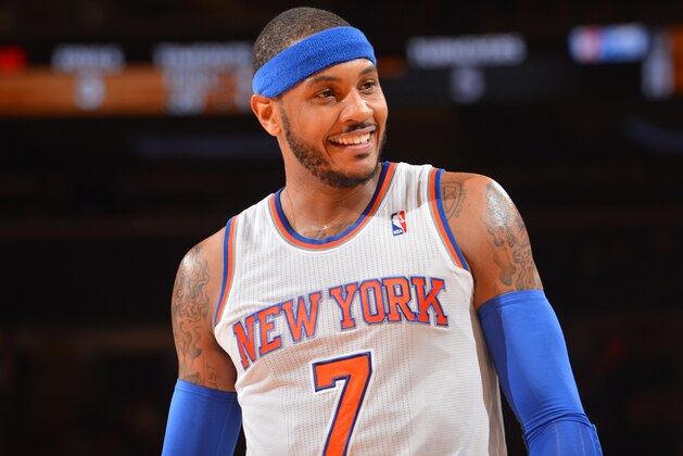 NEW YORK, NY - JANUARY 22: Carmelo Anthony #7 of the New York Knicks smiles against the Philadelphia 76ers during the game on January 22, 2014 at Madison Square Garden in New York City, New York.   NOTE TO USER: User expressly acknowledges and agrees that, by downloading and or using this photograph, User is consenting to the terms and conditions of the Getty Images License Agreement. Mandatory Copyright Notice: Copyright 2013 NBAE (Photo by Jesse D. Garrabrant/NBAE via Getty Images)
