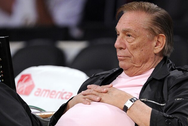 FILE - In this Oct. 17, 2010 file photo, Los Angeles Clippers team owner Donald Sterling watches his team play in Los Angeles. A jury has returned a $17.3 million verdict against Sterling in a lawsuit by an actress who lost most of her belongings in a fire at a West Hollywood apartment building he owns. City News Service says the jury awarded $15 million in punitive damages to Robyn Cohen on Tuesday, Dec. 17, 2012, in her breach-of-contract and emotional distress lawsuit. (AP Photo/Mark J. Terrill, File)