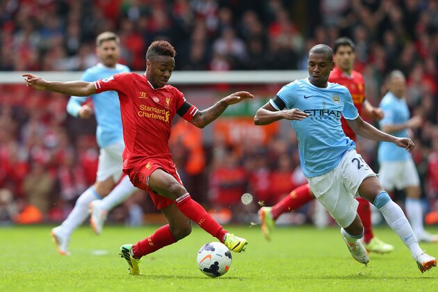 LIVERPOOL, ENGLAND - APRIL 13:  Raheem Sterling of Liverpool competes with Fernandinho of Manchester City during the Barclays Premier League match between Liverpool and Manchester City at Anfield on April 13, 2014 in Liverpool, England.  (Photo by Alex Livesey/Getty Images)
