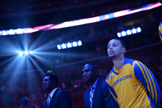 LOS ANGELES, CA - MAY 3: Stephen Curry #30 of the Golden State Warriors looks on during the performance of the National Anthem before facing the Los Angeles Clippers in Game Seven of the Western Conference Quarterfinals during the 2014 NBA Playoffs at Staples Center on May 3, 2014 in Los Angeles, California. NOTE TO USER: User expressly acknowledges and agrees that, by downloading and/or using this Photograph, user is consenting to the terms and conditions of the Getty Images License Agreement. Mandatory Copyright Notice: Copyright 2014 NBAE (Photo by Noah Graham/NBAE via Getty Images)