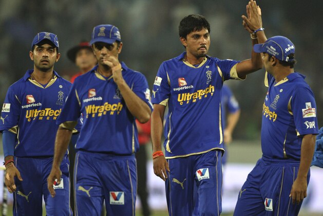 Rajasthan Royals' bowler Siddharth Trivedi, second right, celebrates after dismissing Deccan Chargers' Akshath Reddy during their Indian Premier League (IPL) cricket match in Hyderabad, India, Friday, May 18, 2012. (AP Photo/Mahesh Kumar A.)