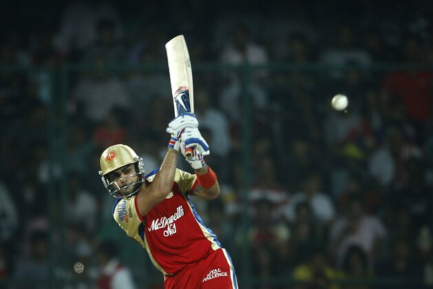 Virat Kohli of Royal Challengers Bangalore plays a shot during their IPL cricket match against Delhi Daredevils, in New Delhi, India, Thursday, May 17, 2012. (AP Photo/ Saurabh Das)