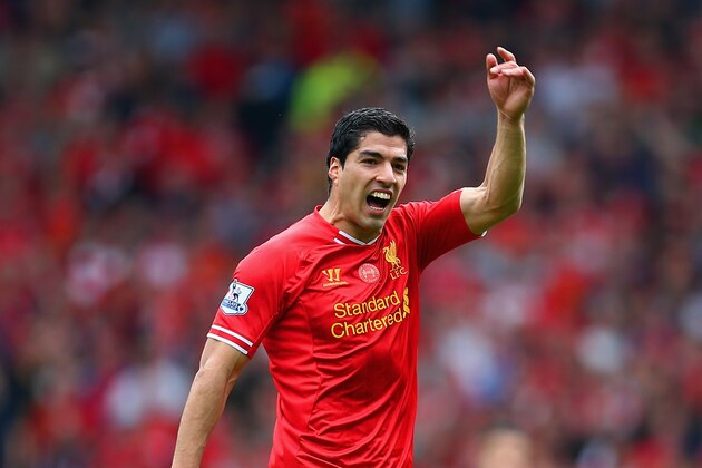 LIVERPOOL, ENGLAND - APRIL 27:  Luis Suarez of Liverpool signals during the Barclays Premier League match between Liverpool and Chelsea at Anfield on April 27, 2014 in Liverpool, England.  (Photo by Clive Brunskill/Getty Images)