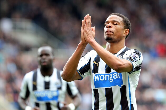 Newcastle United's Loic Remy celebrates his goal  during their English Premier League soccer match against Cardiff City at St James' Park, Newcastle, England, Saturday, May 3, 2014. (AP Photo/Scott Heppell)