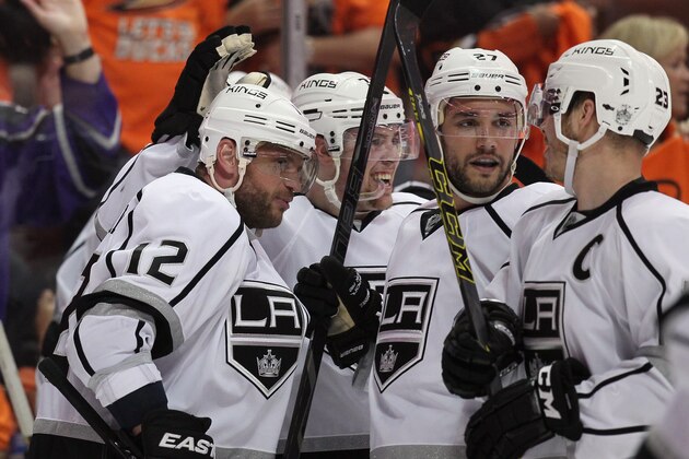 ANAHEIM, CA - MAY 03:  (L-R) Marian Gaborik #12, Tanner Pearson #70, Alec Martinez #27 and Dustin Brown #23 of the Los Angeles Kings celebrate Gaborik's overtime goal against the Anaheim Ducks in Game One of the Second Round of the 2014 NHL Stanley Cup Playoffs at Honda Center on May 3, 2014 in Anaheim, California. The Kings defeated the Ducks 3-2 in overtime.  (Photo by Jeff Gross/Getty Images)
