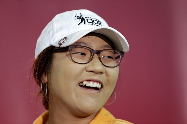 New Zealand amateur golfer Lydia Ko smiles during a news conference at the LPGA Kraft Nabisco Championship golf tournament in Rancho Mirage, Calif., Wednesday, April 3, 2013. (AP Photo/Chris Carlson)