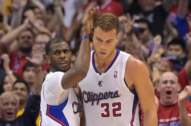 Los Angeles Clippers guard Chris Paul, left, pats forward Blake Griffin on the head during the second half in Game 7 of an opening-round NBA basketball playoff series against the Golden State Warriors, Saturday, May 3, 2014, in Los Angeles. The Clippers won 126-121. (AP Photo/Mark J. Terrill) Los Angeles Clippers guard Chris Paul, left, pats forward Blake Griffin on the head during the second half in Game 7 of an opening-round NBA basketball playoff series against the Golden State Warriors, Saturday, May 3, 2014, in Los Angeles. The Clippers won 126-121. (AP Photo/Mark J. Terrill)