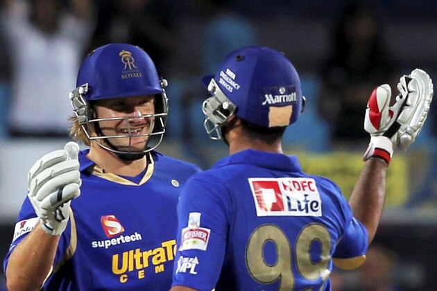 Rajasthan Royals' Shane Watson, left and Owais Shah celebrate their win against Pune Warriors during their Indian Premier League (IPL) cricket match in Pune, India, Tuesday, May 8, 2012. (AP Photo) INDIA OUT