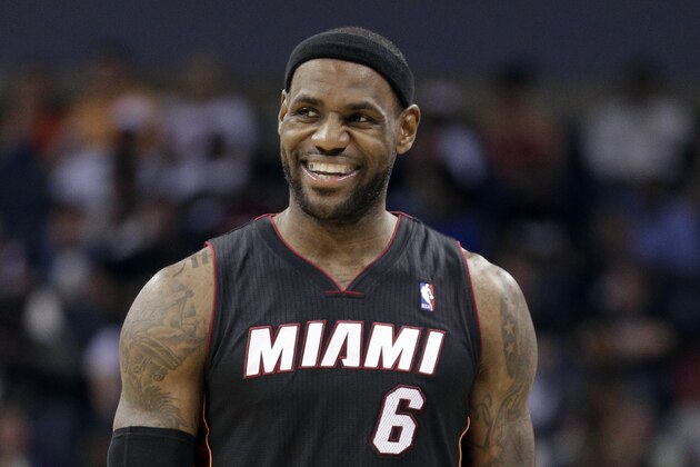 Miami Heat's LeBron James as he walks down the court during the second half in Game 4 of an opening-round NBA basketball playoff series against the Charlotte Bobcats in Charlotte, N.C., Monday, April 28, 2014. The Heat won 109-98, sweeping the series. (AP Photo/Chuck Burton)