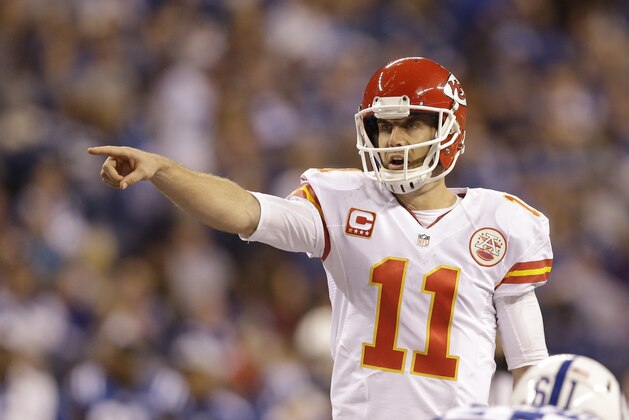 Kansas City Chiefs' Alex Smith (11) calls a play during the second half of an NFL wild-card playoff football game against the Indianapolis Colts Saturday, Jan. 4, 2014, in Indianapolis. (AP Photo/Michael Conroy)