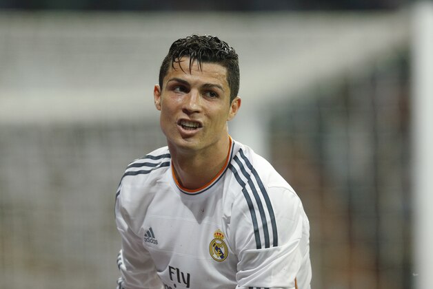 Real Madrid's Cristiano Ronaldo from Portugal during a Spanish La Liga soccer match between Real Madrid and Valencia at the Santiago Bernabeu stadium  in Madrid, Spain, Sunday, May 4, 2014 . (AP Photo/Daniel Ochoa de Olza)
