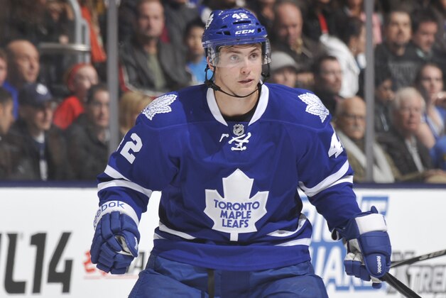 TORONTO, ON - APRIL 1: Tyler Bozak #42 of the Toronto Maple Leafs skates during NHL game action against the Calgary Flames April 1, 2014 at the Air Canada Centre in Toronto, Ontario, Canada. (Photo by Graig Abel/NHLI via Getty Images)