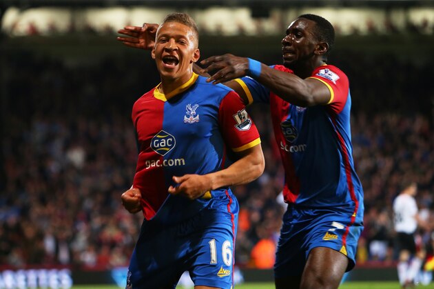 LONDON, ENGLAND - MAY 05:  Dwight Gayle #16 (L) of Crystal Palace celebrates with teammate Yannick Bolasie after scoring his team's third goal to level the scores at 3-3 during the Barclays Premier League match between Crystal Palace and Liverpool at Selhurst Park on May 5, 2014 in London, England.  (Photo by Clive Rose/Getty Images)