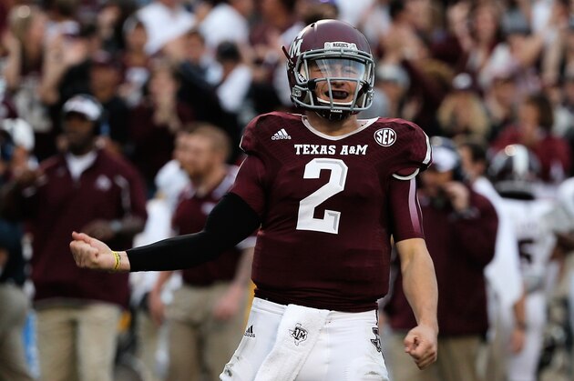 COLLEGE STATION, TX - NOVEMBER 09:  Johnny Manziel #2 of the Texas A&M Aggies celebrates a touchdown pass in the third quarter during the game against the Mississippi State Bulldogs at Kyle Field on November 9, 2013 in College Station, Texas.  (Photo by Scott Halleran/Getty Images)