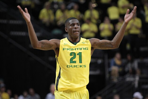 Feb 1, 2014; Eugene, OR, USA; Oregon Ducks guard Damyean Dotson (21) reacts during the game against the USC Trojans at Matthew Knight Arena. Mandatory Credit: Scott Olmos-USA TODAY Sports