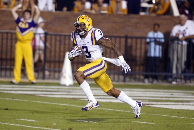 LSU wide receiver Odell Beckham Jr. (3) runs back a kick return against Mississippi state in the first half of their NCAA college football game in Starkville, Miss., Saturday, Oct. 5, 2013. No. 10 LSU won 59-26.  (AP Photo/Rogelio V. Solis)