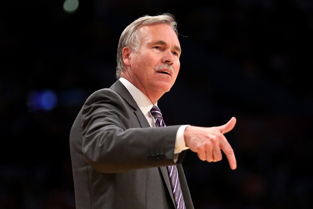 LOS ANGELES, CA - MARCH 30:  Head coach Mike D'Antoni of the Los Angeles Lakers gestures during the game with the Phoenix Suns at Staples Center on March 30, 2014 in Los Angeles, California.  NOTE TO USER: User expressly acknowledges and agrees that, by downloading and or using this photograph, User is consenting to the terms and conditions of the Getty Images License Agreement.  (Photo by Stephen Dunn/Getty Images)