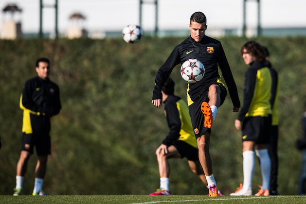 BARCELONA, SPAIN - DECEMBER 10:  Cristian Tello of FC Barcelona controls the ball during a training session ahead of their UEFA Champions League Group H match between FC Barcelona and Celtic FC on December 10, 2013 in Barcelona, Spain.  (Photo by David Ramos/Getty Images)