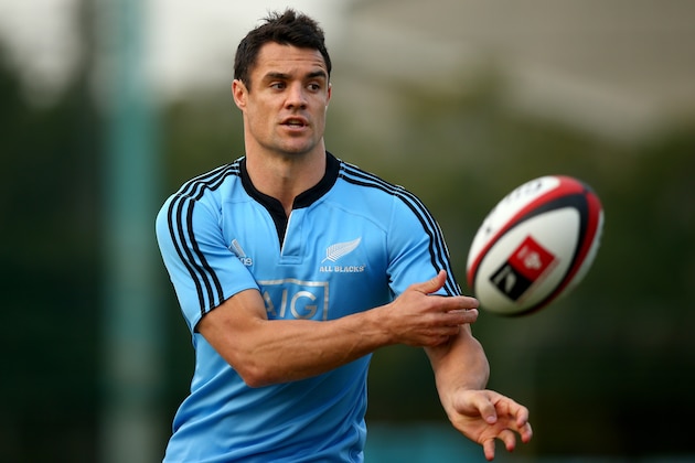 TOKYO, JAPAN - OCTOBER 31:  Dan Carter of the All Blacks passes during a New Zealand All Blacks training session at the Kubota Rugby Club on October 31, 2013 in Tokyo, Japan.  (Photo by Phil Walter/Getty Images)