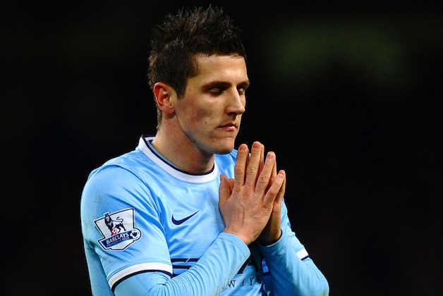 MANCHESTER, ENGLAND - FEBRUARY 03:  A dejected Steven Jovetic of Manchester City reacts  during the Barclays Premier League match between Manchester City and Chelsea at Etihad Stadium on February 3, 2014 in Manchester, England.  (Photo by Laurence Griffiths/Getty Images)