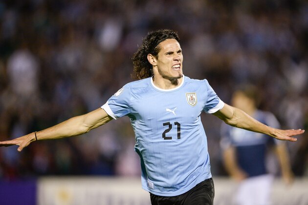 MONTEVIDEO, URUGUAY - OCTOBER 15: Edinson Cavani (#21) of Uruguay celebrates a goal during a match between Uruguay and Argentina as part of the 18th round of the South American Qualifiers for the FIFA's World Cup Brazil 2014 at Centenario Stadium Stadium on October 15, 2013 in Montevideo, Uruguay. (Photo by Buda Mendes/Getty Images)