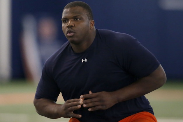 Greg Robinson works out for pro scouts at Auburn's pro day for NFL football scouts Tuesday, March 4, 2014, in Auburn, Ala. (AP Photo/Hal Yeager)
