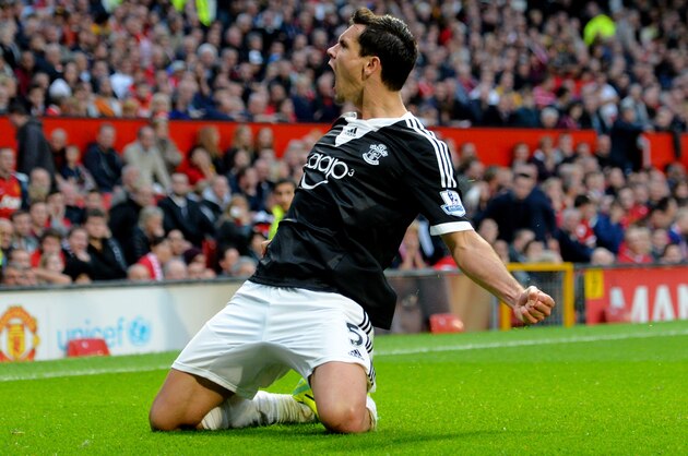 MANCHESTER, ENGLAND - OCTOBER 19:  Dejan Lovren of Southampton celebrates after scoring a late goal to level the scores at 1-1 during the Barclays Premier League match between Manchester United and Southampton at Old Trafford on October 19, 2013 in Manchester, England.  (Photo by Shaun Botterill/Getty Images)