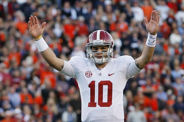 AUBURN, AL - NOVEMBER 30:  AJ McCarron #10 of the Alabama Crimson Tide reacts in the second quarter against the Auburn Tigers at Jordan-Hare Stadium on November 30, 2013 in Auburn, Alabama.  (Photo by Kevin C. Cox/Getty Images)