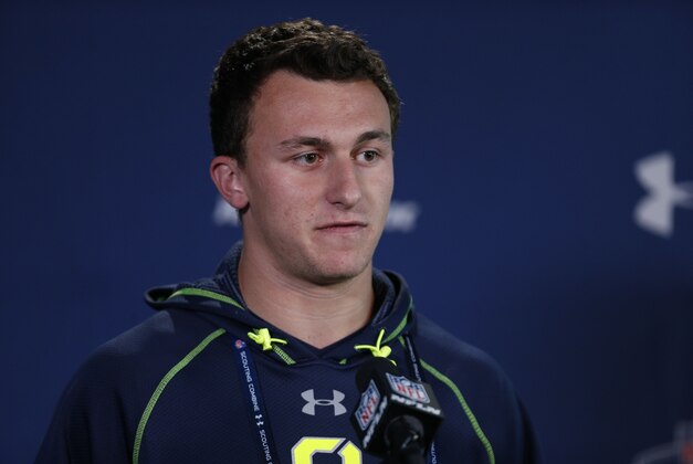Feb 21, 2014; Indianapolis, IN, USA; Texas A&M Aggies quarterback Johnny Manziel speaks to the media in a press conference during the 2014 NFL Combine at Lucas Oil Stadium. Mandatory Credit: Brian Spurlock-USA TODAY Sports