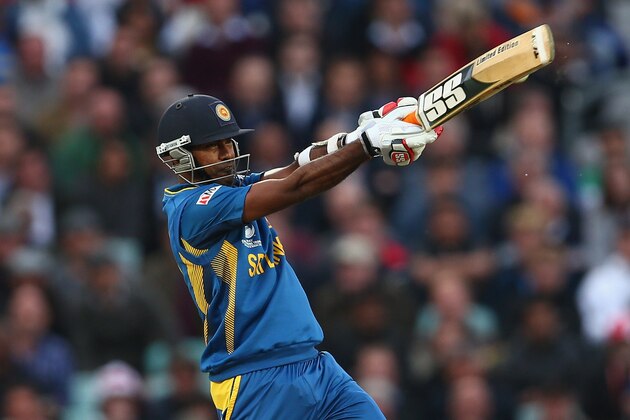 LONDON, ENGLAND - JUNE 13:  Nuwan Kulasekara of Sri Lanka hits out during the ICC Champions Trophy Group A match between England and Sri Lanka at The Kia Oval on June 13, 2013 in London, England.  (Photo by Paul Gilham/Getty Images)
