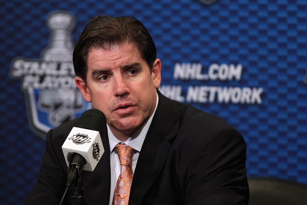 PHILADELPHIA, PA - MAY 01: Head Coach of the Philadelphia Flyers Peter Laviolette speaks to the media after being defeated by the New Jersey Devils 4-1 in Game Two of the Eastern Conference Semifinals during the 2012 NHL Stanley Cup Playoffs on May 1, 2012 at the Wells Fargo Center in Philadelphia, Pennsylvania.  (Photo by Len Redkoles/NHLI via Getty Images)