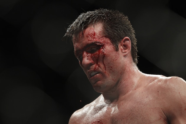 Chael Sonnen stands during a UFC mixed martial arts match against Anderson Silva in Oakland, California, Saturday, August 7, 2010. Silva won by submission in the fifth round to retain the championship. (AP Photo/Jeff Chiu)