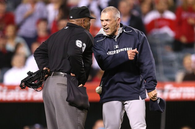 ANAHEIM, CA - MAY 05:  Manager Joe Girardi of the New York Yankees shouts at home plate umpire Laz Diaz after Girardi was ejected for arguing a strike call in the eighth inning against the Los Angeles Angels of Anaheim at Angel Stadium of Anaheim on May 5, 2014 in Anaheim, California.  (Photo by Stephen Dunn/Getty Images)