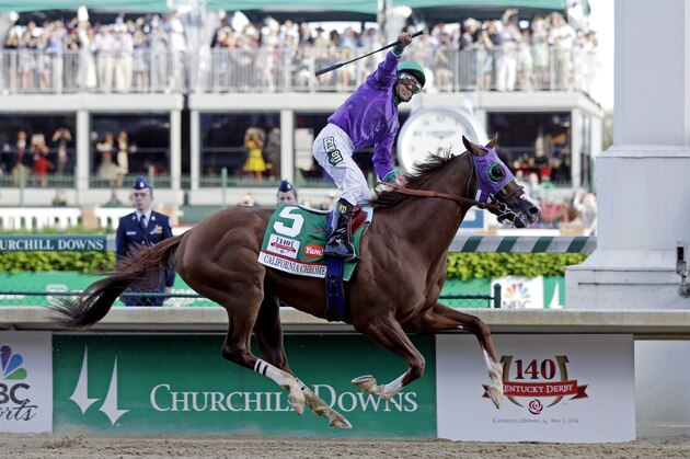 Victor Espinoza rides California Chrome to a victory during the 140th running of the Kentucky Derby horse race at Churchill Downs Saturday, May 3, 2014, in Louisville, Ky. (AP Photo/Morry Gash)