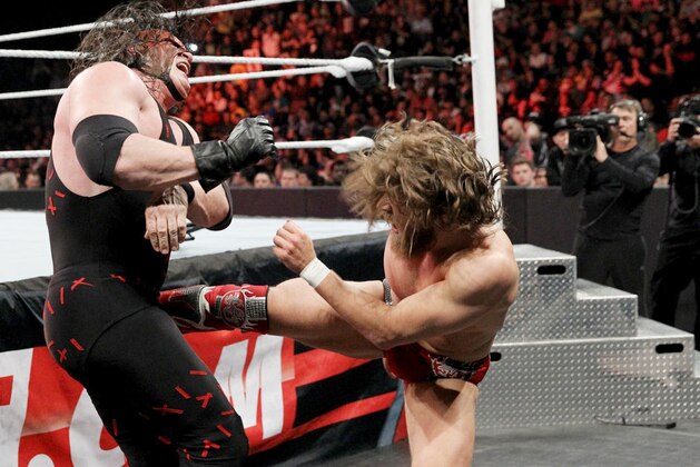 Daniel Bryan kicks Kane.