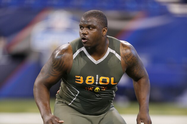 Feb 22, 2014; Indianapolis, IN, USA; Auburn Tigers offensive lineman Greg Robinson participates in drills during the 2014 NFL Combine at Lucas Oil Stadium. Mandatory Credit: Brian Spurlock-USA TODAY Sports