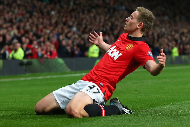 MANCHESTER, ENGLAND - MAY 06:  James Wilson of Manchester United celebrates scoring the second goal during the Barclays Premier League match between Manchester United and Hull City at Old Trafford on May 6, 2014 in Manchester, England.  (Photo by Alex Livesey/Getty Images)