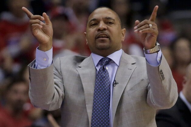 Golden State Warriors head coach Mark Jackson yells to his team during the second half in Game 2 of an opening-round NBA basketball playoff series in Los Angeles, Monday, April 21, 2014. (AP Photo/Chris Carlson)