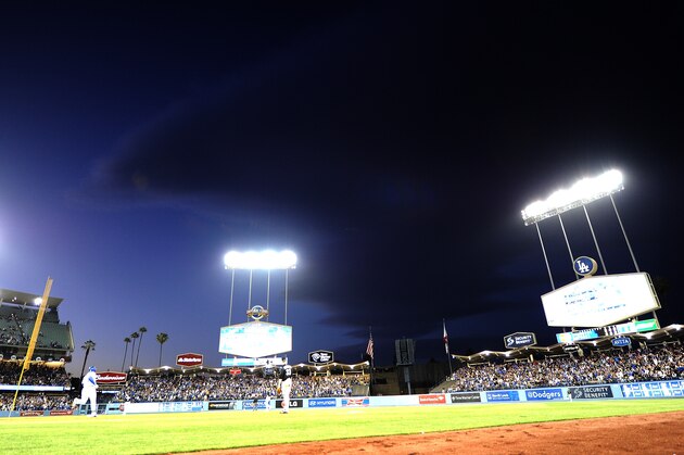 LOS ANGELES, CA - APRIL 26:  Adrian Gonzalez #23 of the Los Angeles Dodgers passes first base after his homerun to take a 5-2 lead over the Colorado Rockies during the fifth inning at Dodger Stadium on April 26, 2014 in Los Angeles, California.  (Photo by Harry How/Getty Images)