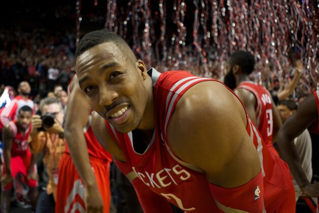 May 2, 2014; Portland, OR, USA; Houston Rockets center Dwight Howard (12) reacts after Portland Trail Blazers guard Damian Lillard (0) last second shot in the second half in game six of the first round of the 2014 NBA Playoffs at the Moda Center.
Mandatory Credit: Jaime Valdez-USA TODAY Sports