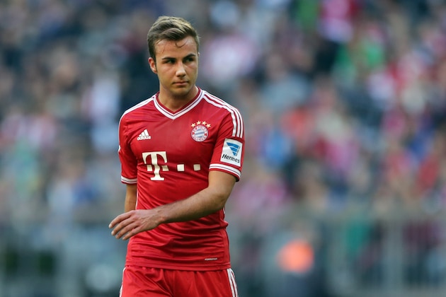 Bayern's Mario Goetze watches his team mates during the German first division Bundesliga soccer match between FC Bayern Munich and FSV Mainz 05, in Munich, southern Germany, Saturday, Oct. 19, 2013. (AP Photo/Matthias Schrader)