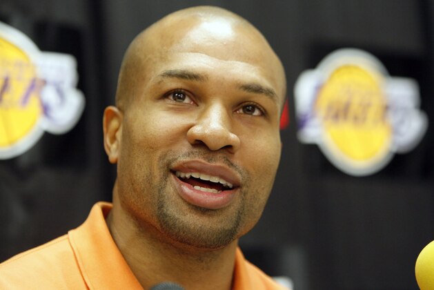 Los Angeles Lakers guard Derek Fisher talks to reporters during exit interviews at the Lakers' basketball practice facility in El Segundo, Calif., Wednesday, June 23, 2010.  (AP Photo/Reed Saxon)