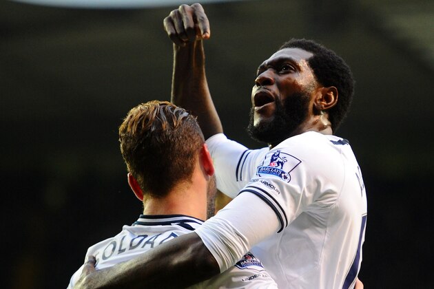 LONDON, ENGLAND - MARCH 02:  Roberto Soldado of Tottenham Hotspur celebrates scoring the opening goal with Emmanuel Adebayor of Tottenham Hotspur during the Barclays Premier League match between Tottenham Hotspur and Cardiff City at White Hart Lane on March 2, 2014 in London, England.  (Photo by Mike Hewitt/Getty Images)
