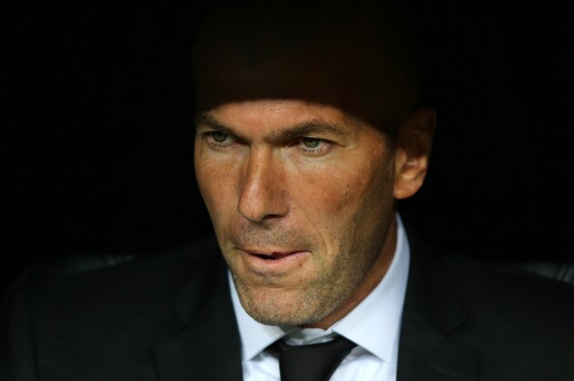 MADRID, SPAIN - APRIL 02:  Real Madrid's assistant manager Zinedine Zidane looks on prior to the UEFA Champions League Quarter Final first leg match between Real Madrid and Borussia Dortmund at Estadio Santiago Bernabeu on April 2, 2014 in Madrid, Spain.  (Photo by Clive Rose/Getty Images)